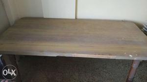 8 seater dining table made of wood