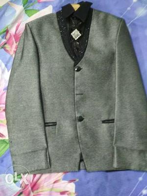 Blazer with pant and pair of shoes can be fit upto 13 yrs.