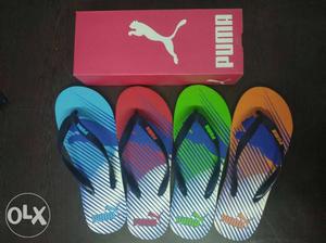 Blue, Red, Green, And Orange Puma Flip-flops With Box