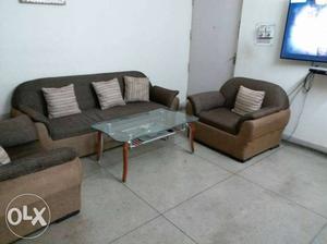 Five seater (3+1+1) sofa set and center table