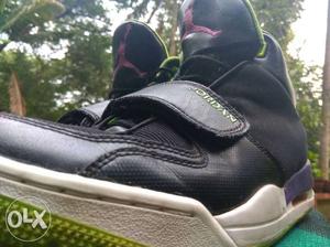 Pair Of Black Air Jordan Velcro Strap Shoes