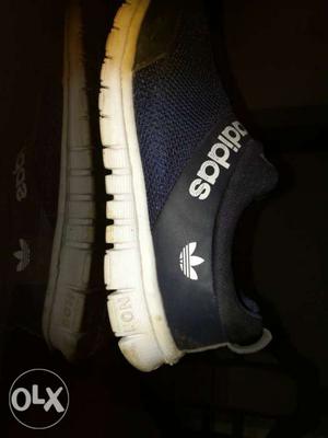 Pair Of Black-and-blue Adidas Running Shoes
