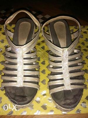 Pair Of Gray Open-toe Strappy Sandals