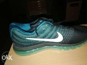 Pair Of Gray-and-teal Nike Running Shoes