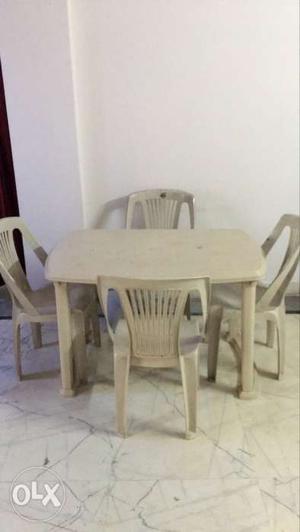 Rectangular White plastic dining table With Four Chairs