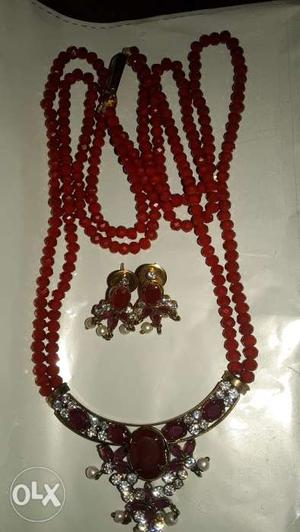 Red color Crystal moti mala with earings.