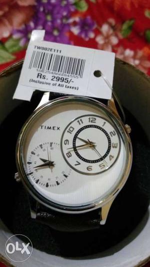 Round Silver-colored Timex Chronograph Watch With Black
