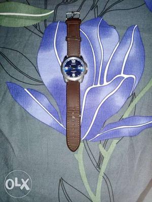 Round Silver-colored Watch With Brown Leather Bracelet