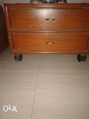 Two bedside tables real wood in good condition.teak wood.