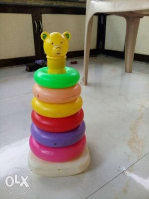 Yellow, Red, And Green Plastic Toy
