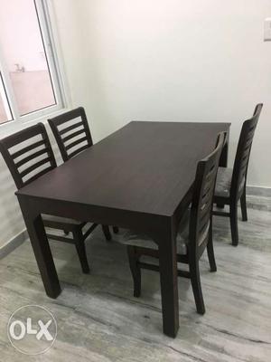 4 seater unused dining table for sale...except