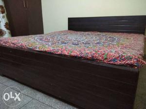A wooden double bed in good condition,1 year old.