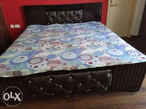 Almost new upholstery bed with storage space selling at half