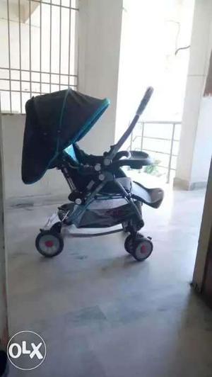 Baby's Blue And Black Stroller for infant