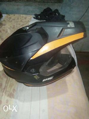 Black And Orange Motocross Helmet