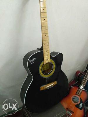 Black semi acoustic guitar 8..1, you can