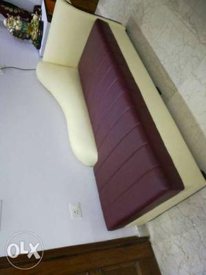 Brand new couch for sale. Cream and dark purple