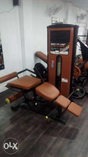 Brown And Black Body Fit Line Exercising Machine