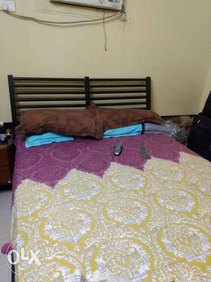 Brown Wooden Bed Frame With Mattress