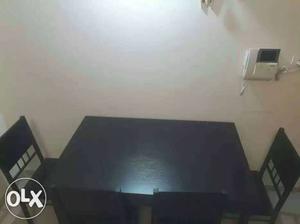 Dinning table with four chairs brand new condition. need to