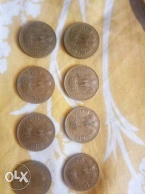Eight Round Brown Coins