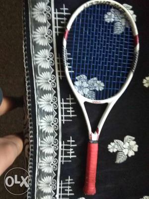 Red And White Tennis Racket