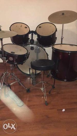 Red, Gray, And Black Drum Set
