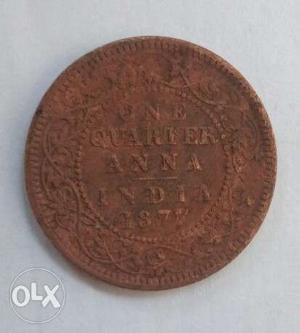 Round Copper-colored 1/4 Indian Anna Coin