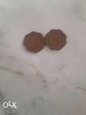 Two Scalloped Edge Copper-colored 10 Indian Paise Coins