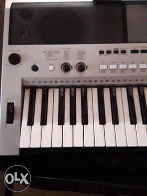 White And Gray Electronic Keyboard