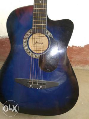 Zixing blue acoustic guitar only 2 month used