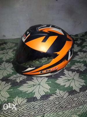 Black, Orange, And White Full-face Helmet