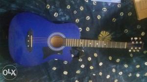 Blue And Black Cutaway Guitar