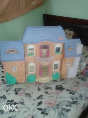 Fisher price doll house. Available with box