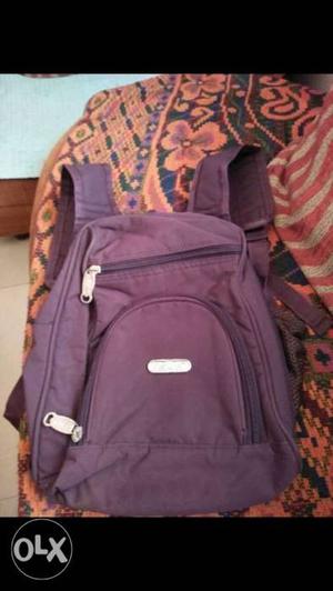 Purple bag very less used slightly price nego