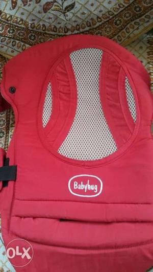Red And White Baby Carrier