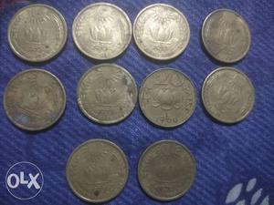Round Gold-colored 20 Indian Pai Se Coin Collection