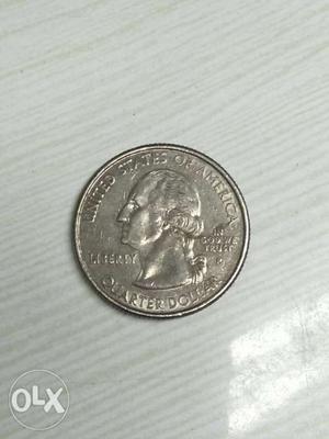 Silver-colored Quarter Dollar Coin