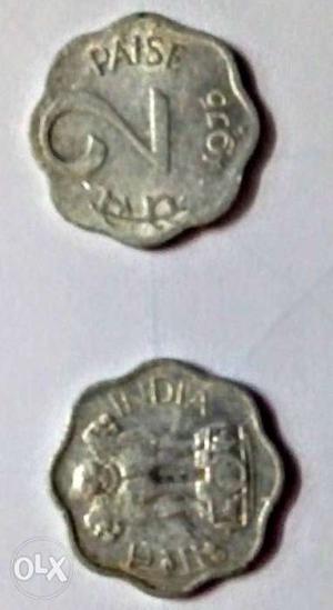 Two Scalloped Grey Coins