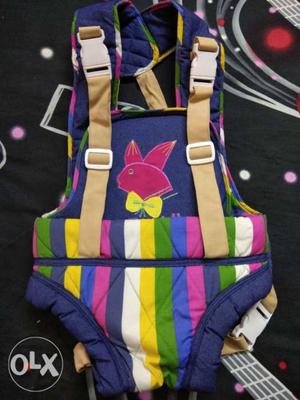 UnusedBaby's Blue, Pink, And Green Stripe Carrier
