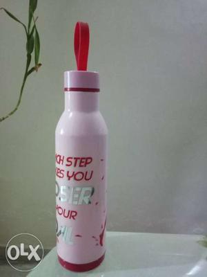 White And Pink Steel and Plastic Bottle
