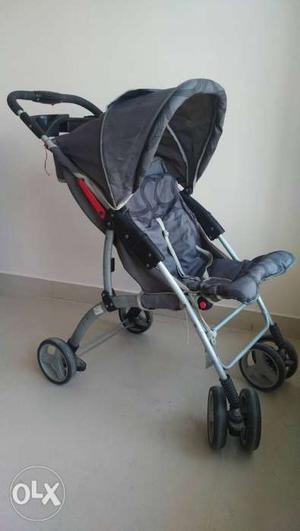 Baby's Black And Gray Stroller