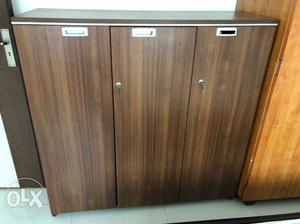 Brown Wooden 3-door medium size Cabinet