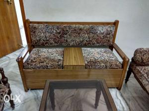 Brown Wooden Framed Padded Armchair