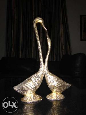Two Silver Duck Figurines