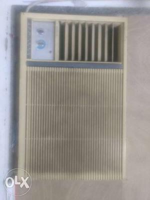 Beige Window-type AC Unit Fully in working condition