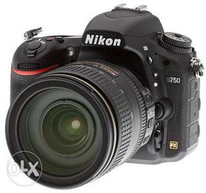 Black Nikon D DSLR Camera with 35 mm micro lenses