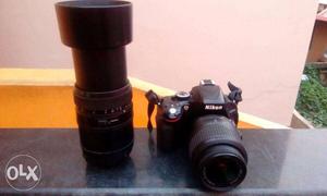Black Nikon DSLR Camera With 2 Lens