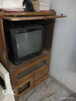 Brown Wooden TV Hutch With CRT Television nine 928seven
