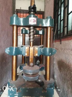 Green And Brown Metal Drill Press Machine